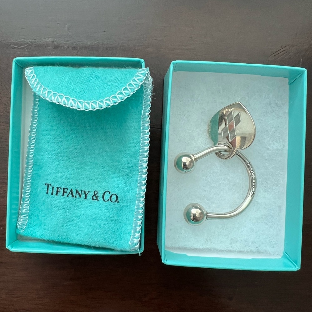 Tiffany & Co. Sterling Silver Key Ring with heart charm with pouch and box.